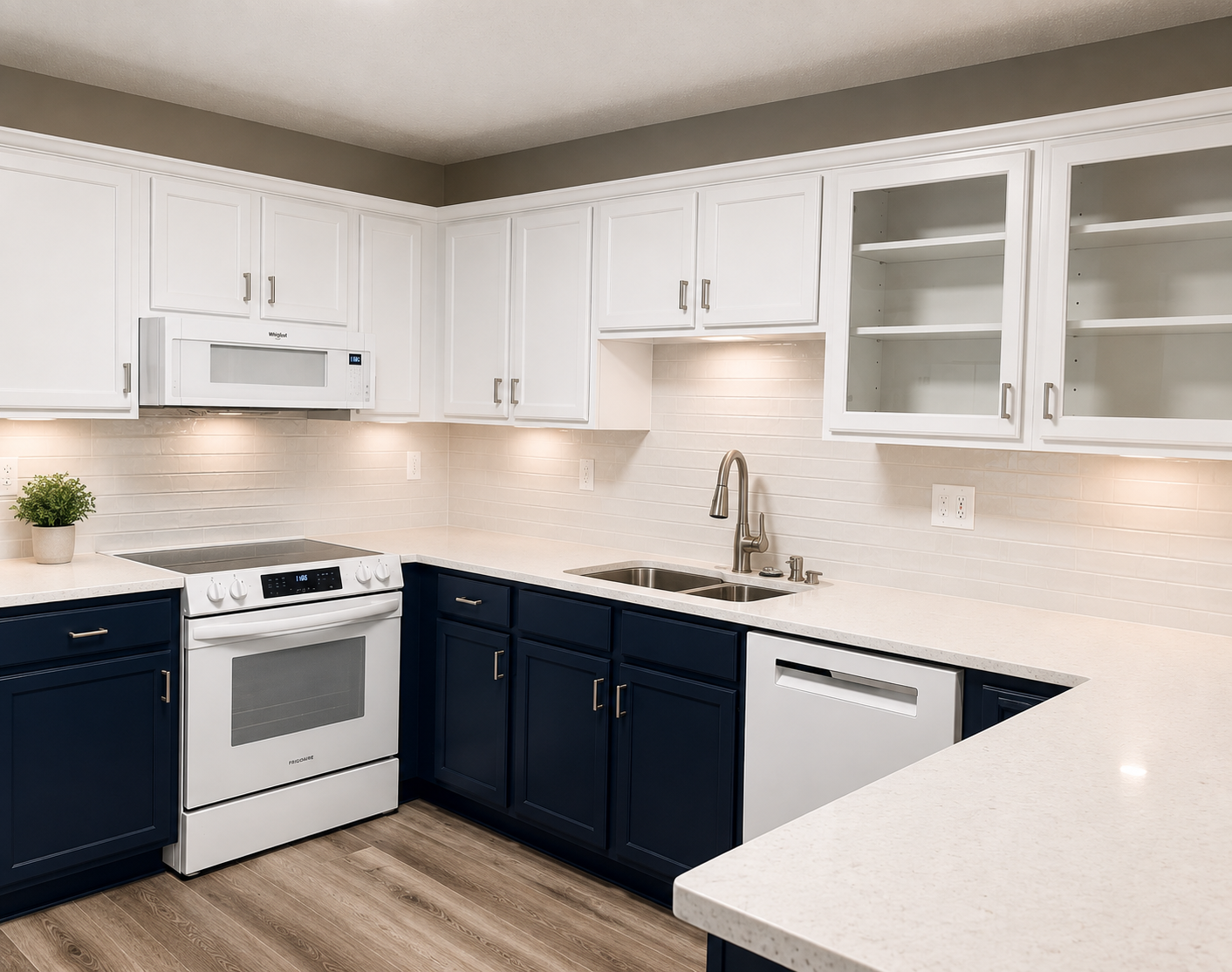Kitchen with navy lower cabinets and white uppers